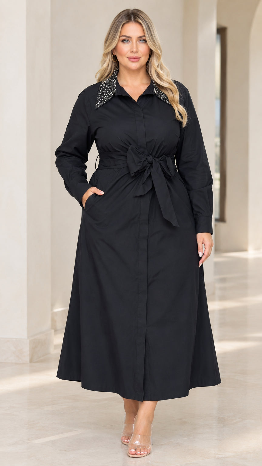 Front view of model wearing black long sleeve maxi shirt dress with rhinestone collar