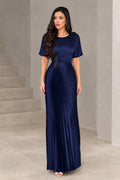 Front full-length view of woman wearing navy blue pleated short sleeve maxi dress