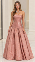 Front view of model wearing Rose Gold strapless drop-waist shimmering evening ball gown