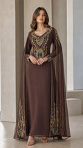 Front view of woman wearing brown embellished cape sleeve evening maxi dress