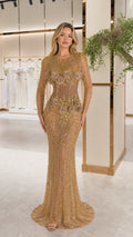 Gold long sleeve beaded mermaid evening gown front view