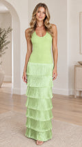 Front view of model wearing lime green sleeveless tiered fringe maxi dress