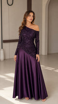 Front view of model wearing deep purple one-shoulder sequin and satin maxi gown