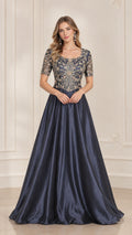 Front view of model wearing Navy Blue embroidered bodice short sleeve A-line evening gown