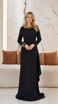 Front view of black long sleeve evening gown with crystal shoulder details