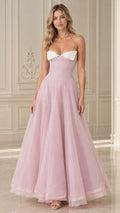 Front view of model wearing Blush Pink strapless formal evening gown with white contrast foldover neckline