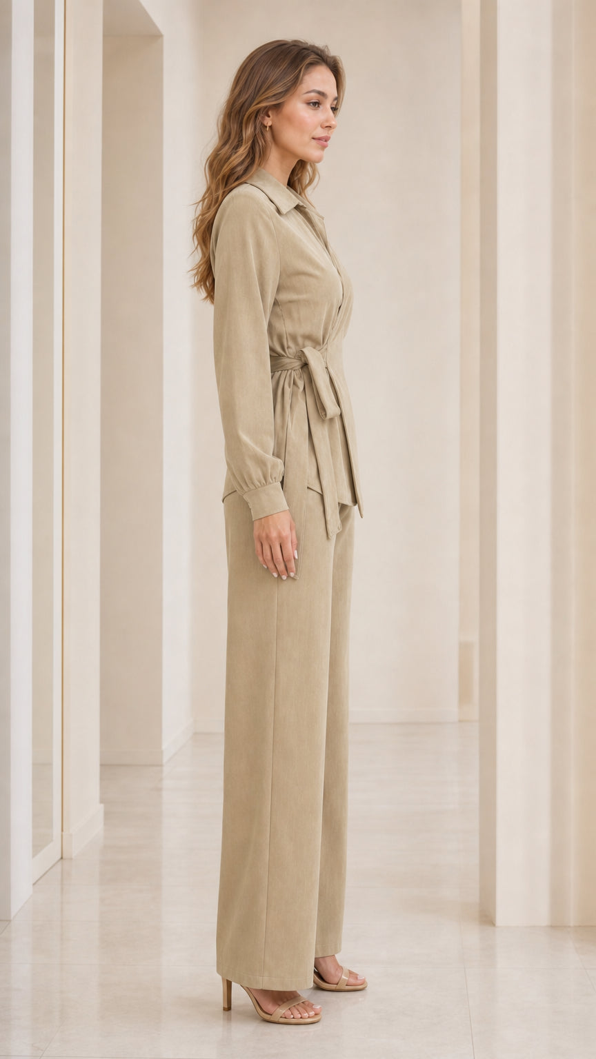 Side profile view of woman wearing khaki pant set