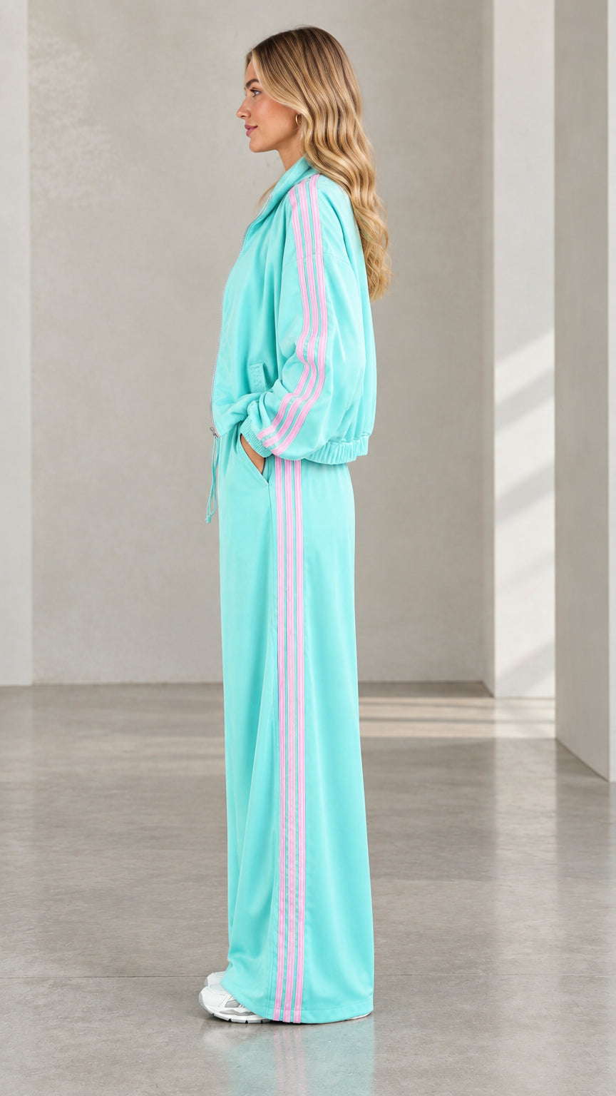 Side profile view of mint green wide leg tracksuit set