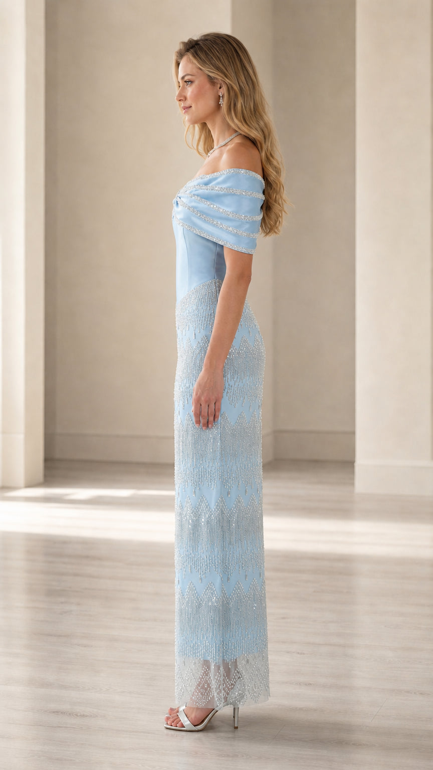 Side profile view of light blue basque waist formal dress with beaded column skirt