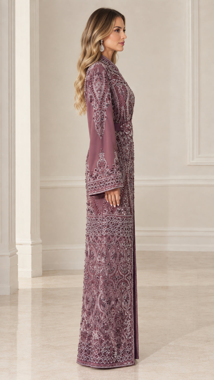 Side profile of model in plum beaded kaftan maxi gown showing sleeve detailing
