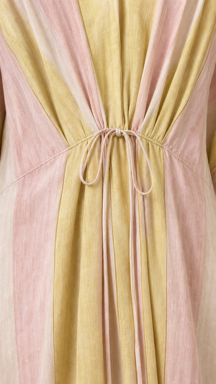 Close-up of drawstring waist detail on striped kaftan dress
