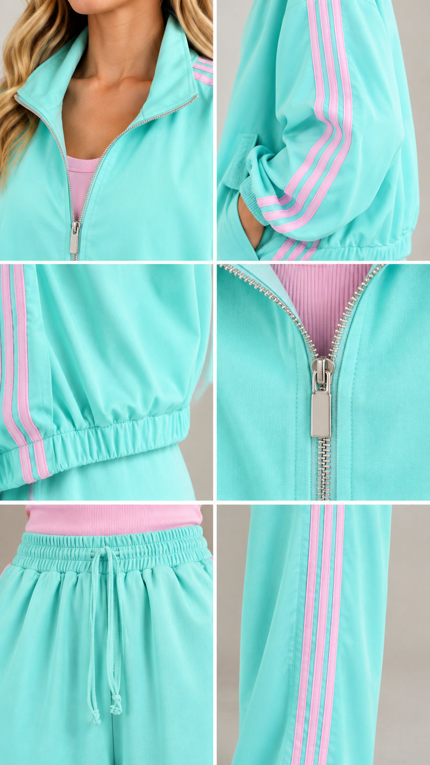 Close-up details of mint green jacket zipper, elastic cuffs, waistband, and side stripes